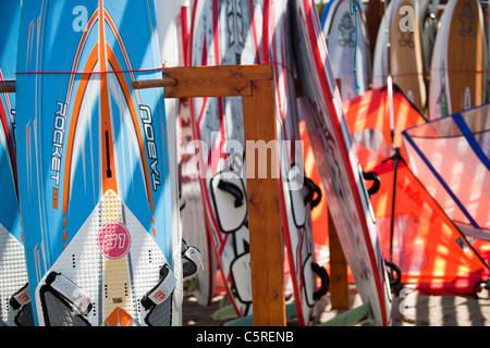 Windsurfing boards at an activity holiday centre in Skala Eresou, on Lesbos, Greece. Stock Photo