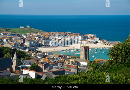 St Ives -  general view of  seaside town showing the harbour / beach, The Island and shops / houses  Cornwall, UK. Stock Photo