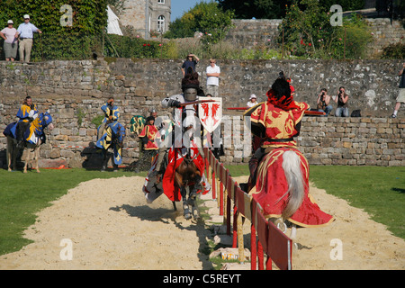 Knights, tournament chivalry. Medieval Festival in Domfront (Orne,  Normandy, France). Company Atchaka. Stock Photo