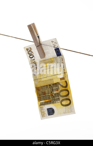 200 Euro bank note hanging on clothesline Stock Photo
