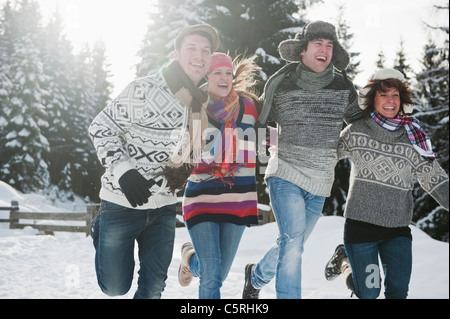 Austria, Salzburg Country, Flachau, Young people having fun in snow Stock Photo
