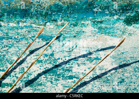 An old traditional Greek fishing boat on the beach at Skala Eresou, Lesbos, Greece. Stock Photo