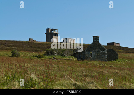 dh Stanger Head FLOTTA ORKNEY Ruined stone cottage and wartime battery ruins uk Stock Photo