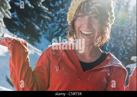 Austria, Salzburg Country, Flachau, Young woman having fun in snow Stock Photo