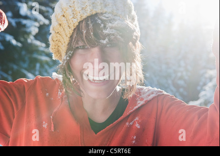 Austria, Salzburg Country, Flachau, Young woman having fun in snow Stock Photo