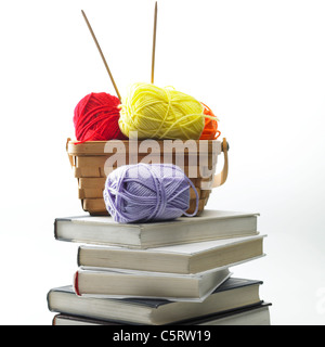 Basket of knitting balls and other objects Stock Photo