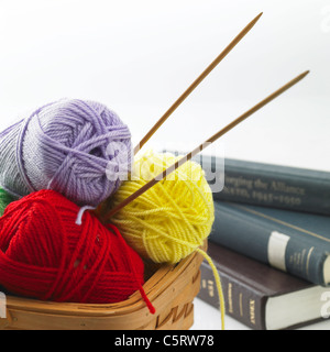 Basket of knitting balls and other objects Stock Photo