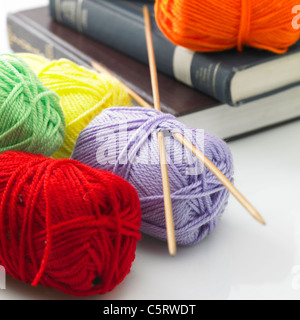 Knitting balls and books Stock Photo