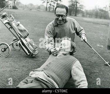 CHARLIE DRAKE (1925-2006) English comic actor with fellow comedian Arthur Askey about 1960 Stock Photo