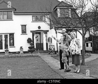 CHARLIE DRAKE (1925-2006) English comic actor at his Weybridge home about 1958 with wife Heather and sons Stock Photo