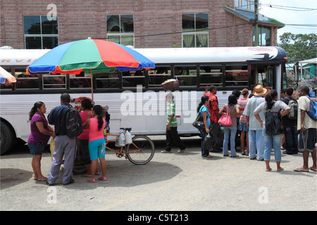 Stalls providing food and drink to people waiting for buses in San Ignacio town centre, Cayo, west Belize, Central America Stock Photo