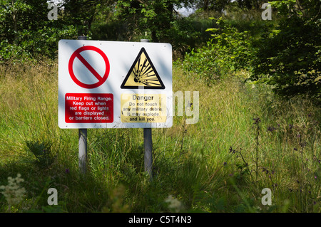 Coquetdale, Northumberland, England - sign warning of military firing range and risk Stock Photo