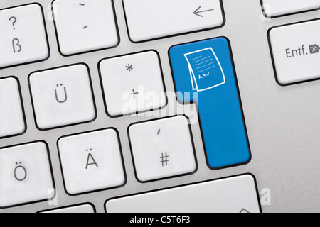 Illustration of keyboard having blue key with documents, close up Stock Photo