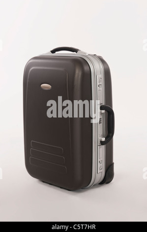 Black suitcase against white background Stock Photo