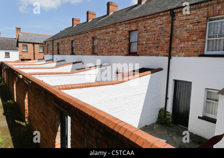 Back yards of a row of Victorian terraced houses at the Ulster Folk Park Museum Stock Photo