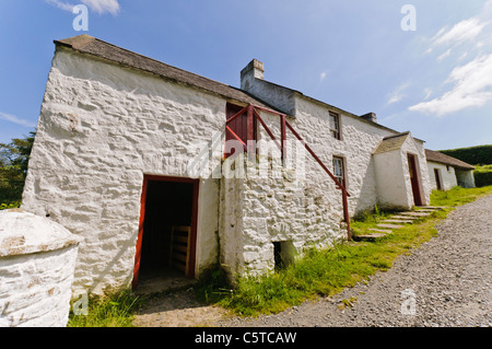 Traditional Irish whitewashed farmhouse built on a hill at the Ulster Folk Park Museum Stock Photo