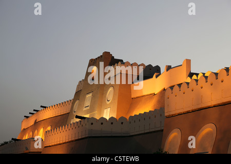 Fortified gate to Muttrah at night. Muscat, Sultanate of Oman Stock Photo