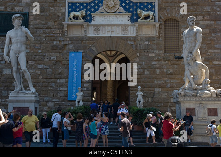 The Palazzo Vecchio ( town hall ) with a copy  of David in Florence Tuscany Italy Stock Photo