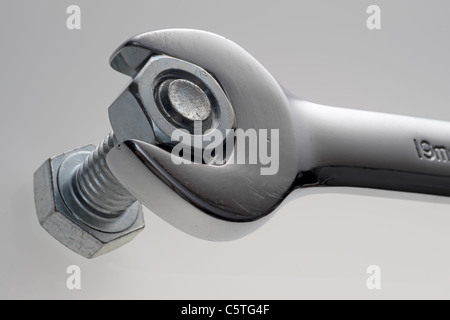 Extreme close up of a wrench, nut, and bolt Stock Photo