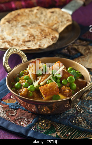 Mattar paneer. Indian cheese and peas dish. Stock Photo