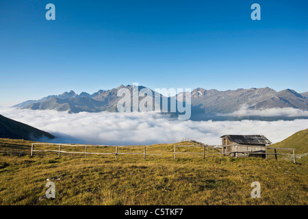 Austria, GroÃŸglockner, Mountain scenery, cabin and clouds Stock Photo