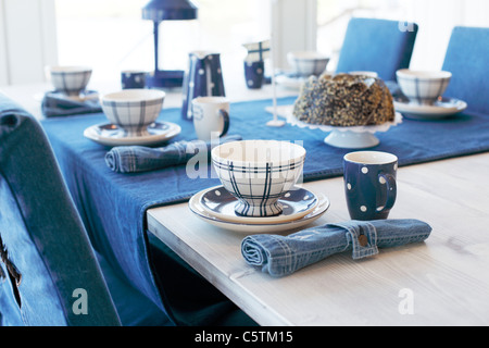 Dining room setting with a finnish blue/white theme. Stock Photo