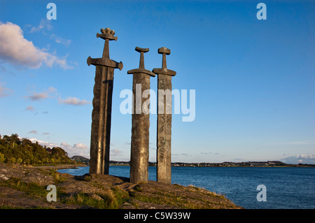 The Three Swords (Sverd i Fjell) monument stand on the edge of Hafrsfjord, 6km from the centre of Stavanger, Norway Stock Photo