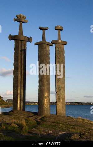 The Three Swords (Sverd i Fjell) monument stand on the edge of Hafrsfjord, 6km from the centre of Stavanger, Norway Stock Photo