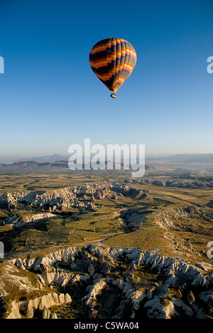 Turkey, Cappadocia, Goreme, View of hot air balloons flight over landscape Stock Photo