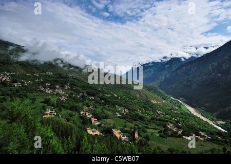 Houses scattered on the hillside at Jiaju Tibetan Village. Sichuan, China. Stock Photo