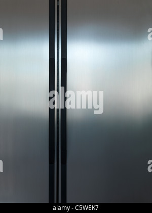 A modern duel stainless steel kitchen fridge Stock Photo