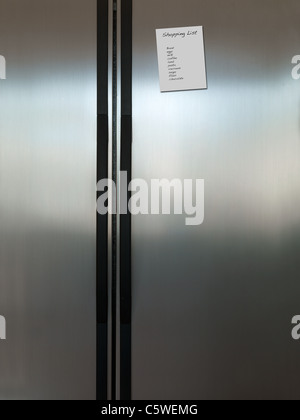 A modern duel stainless steel kitchen fridge Stock Photo