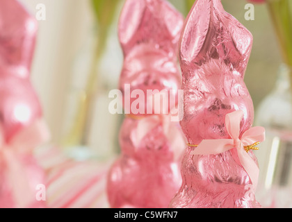 Pink wrapped chocolate easter bunnies Stock Photo