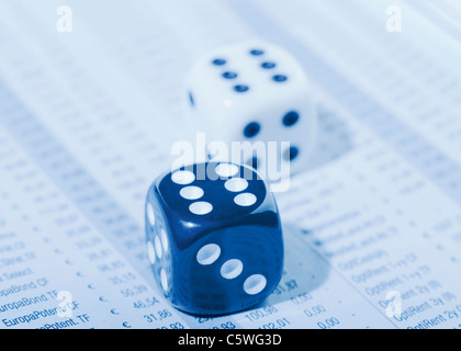 Two dices on stock prices list Stock Photo