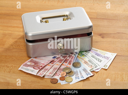 Cash box with euro notes and coins Stock Photo