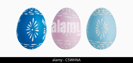 Three painted easter eggs against white background, close up Stock Photo