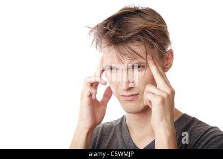 Man suffering from headache on a white background Stock Photo