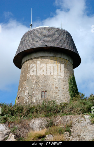 Melin Wynt y Craig, a traditional 19th century windmill in Llangefni, Anglesey, now converted into a mobile phone mast. Stock Photo