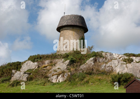 Melin Wynt y Craig, a traditional 19th century windmill in Llangefni, Anglesey, now converted into a mobile phone mast. Stock Photo