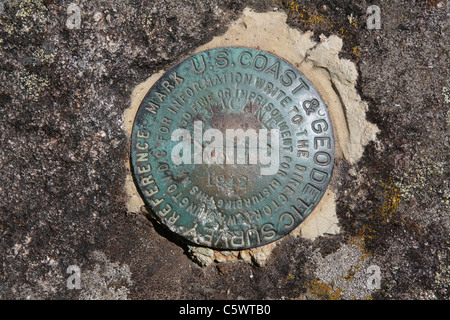 US Coast and Geodetic Survey Triangulation Station Mountaintop Benchmark, Hurricane Mountain in the Adirondacks, Placed in 1942 Stock Photo