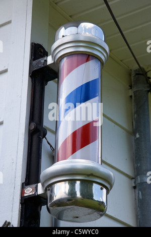 traditional barber shop pole sign in Lynchburg , tennessee , usa Stock Photo