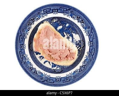 Liver pate spread onto a slice of white bread Stock Photo