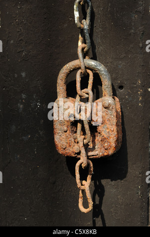 Rusted padlock and chain Stock Photo
