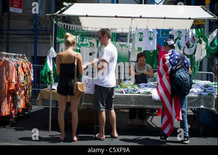 Shopping at the street fair following the Pakistani Independence Day Parade Stock Photo