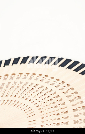 Isolated wooden fan on white background Stock Photo