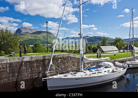 Yachts moving north through the locks on the Caledonian Canal at Banavie near Fort William in Scotland Stock Photo