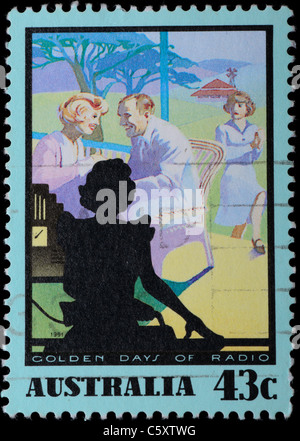 AUSTRALIA - CIRCA 1991: A stamp printed in Australia shows couple golden days of radio, circa 1991 Stock Photo