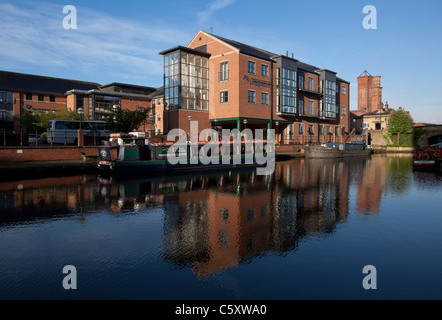 Modern buildings by The River Aire in Leeds, part of the waterfront redevelopment. Stock Photo