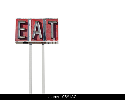 Tall eat sign ruin along a California desert highway. Stock Photo