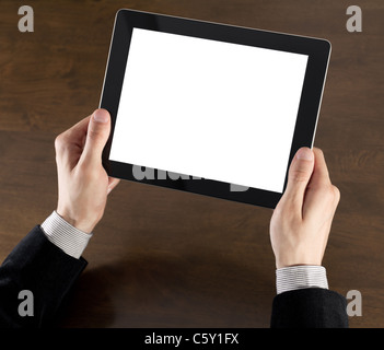Businessman hands are holding the touch screen device. Stock Photo